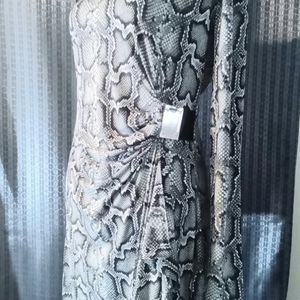A used Micheal Kors dress